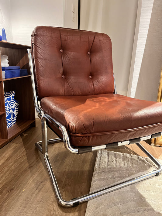 Paire de fauteuils en cuir marron appartement.basile